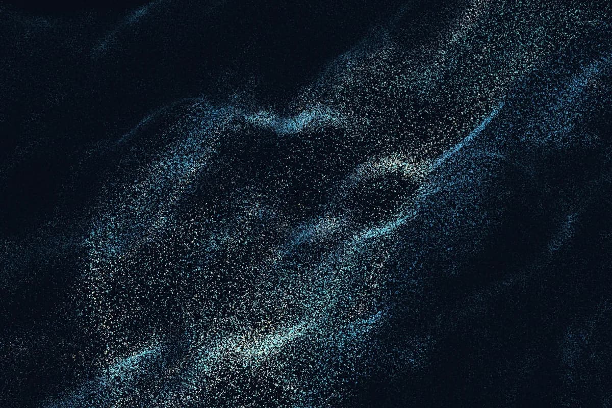 Blue, cyan, and gold particles flowing like a turbulent tide